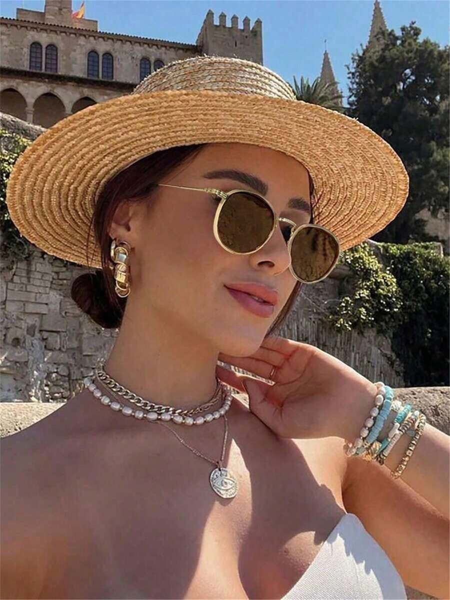 Lentes de sol con montura redonda metálica