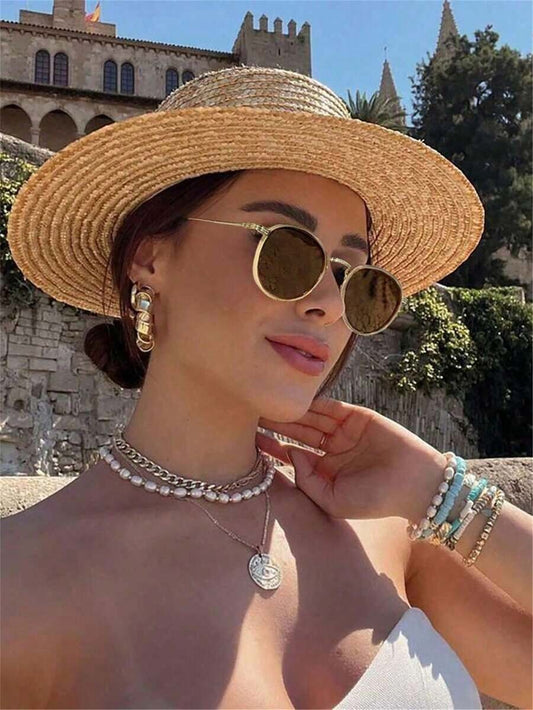 Lentes de sol con montura redonda metálica