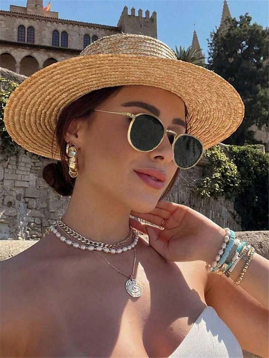 Lentes de sol con montura redonda metálica