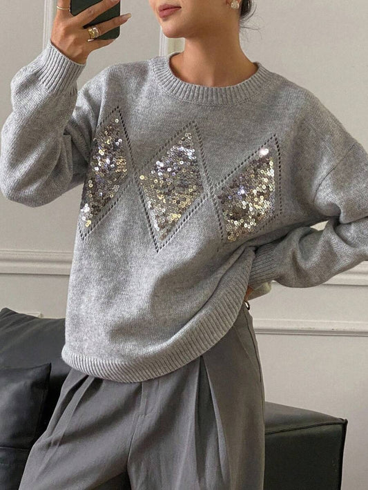 Suéter holgado de cuello redondo con adornos de lentejuelas