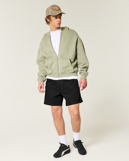 Shorts de sarga a medio muslo unicolor