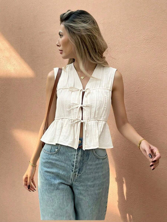 Blusa sin mangas con pliegues frontales y cordones