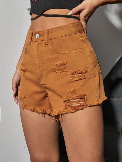 Shorts denim rotos bajo crudo